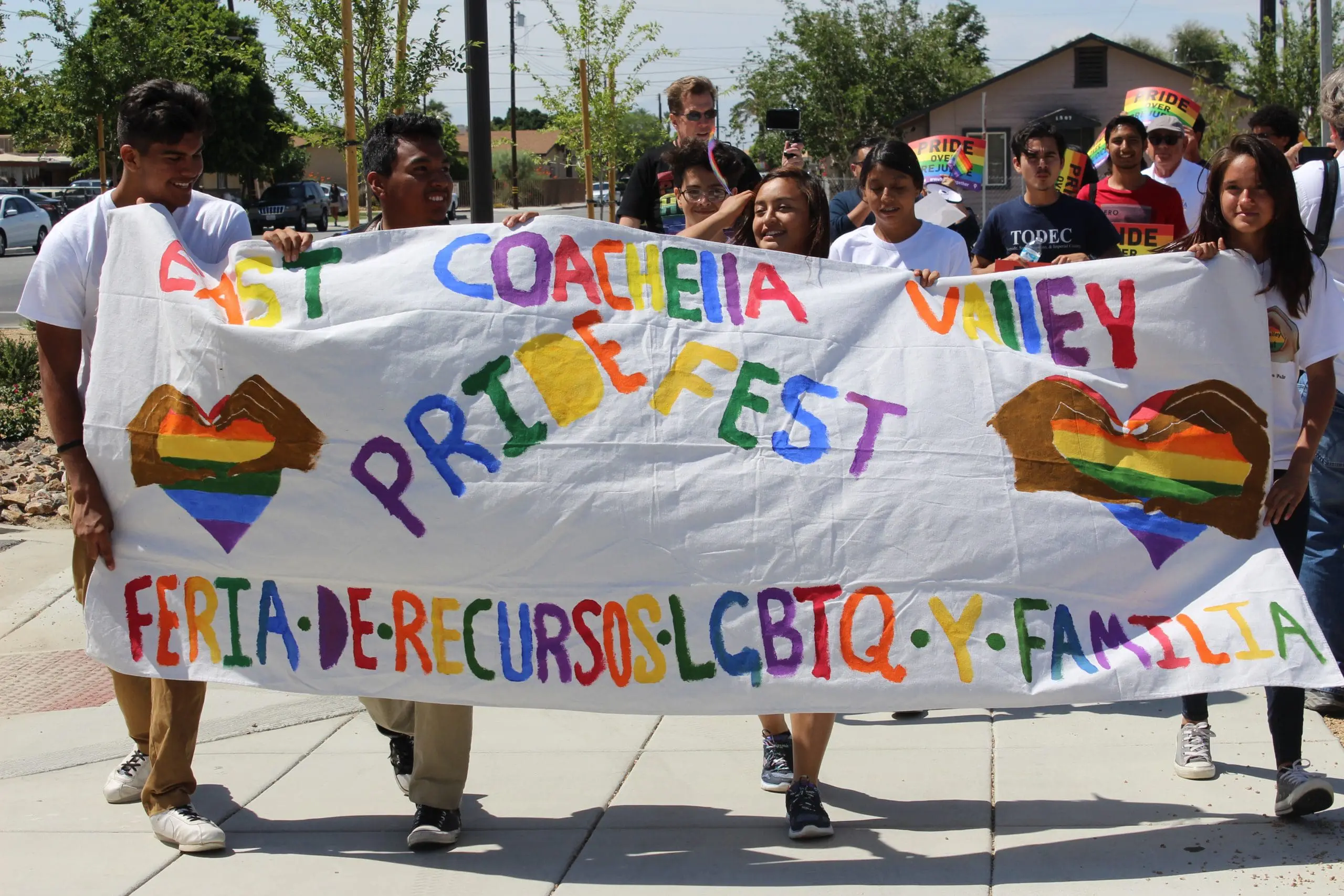 Participants march in the first Eastern Coachella Valley LGBTQ+ Pride Festival.